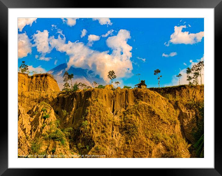 Vulcan Merapi behind steep hill 2 Framed Mounted Print by Hanif Setiawan