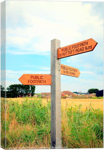 Coastal footpath signpost at Sutton on Sea, Lincolnshire. Canvas Print by john hill