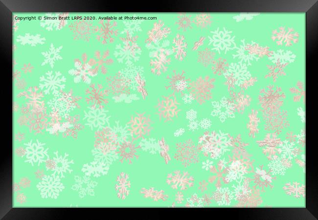 Falling snowflakes pattern on green background Framed Print by Simon Bratt LRPS