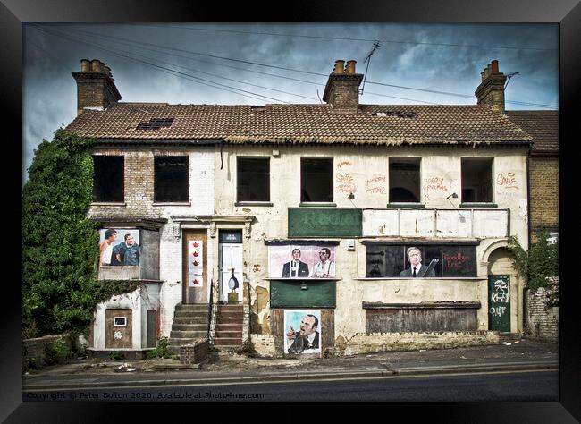 Empty and derelict victorian terrace of houses used as a canvas by local artists at Southend on Sea, Essex, UK. Framed Print by Peter Bolton