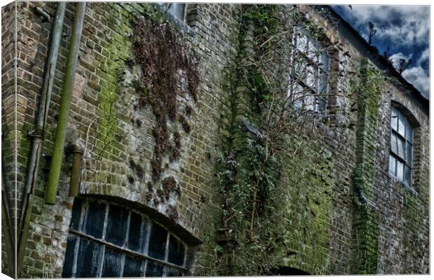 Wall at a derelict workshop in Southend on sea, Essex, UK. Canvas Print by Peter Bolton