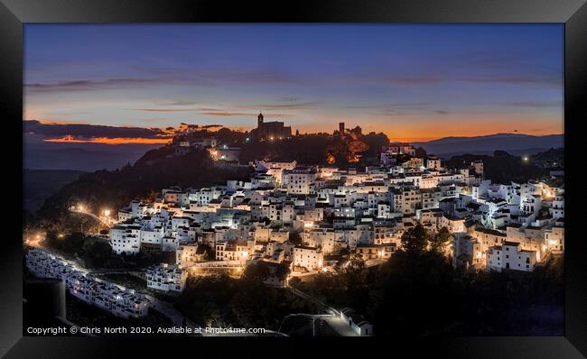 The white mountain village of Casares. Framed Print by Chris North