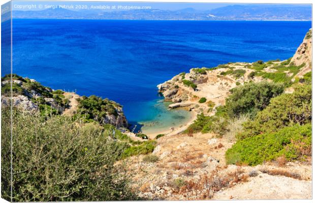A beautiful view from a steep rocky slope on the Corinthian Gulf and the blue lagoon on the coast, a beautiful view from above. Canvas Print by Sergii Petruk