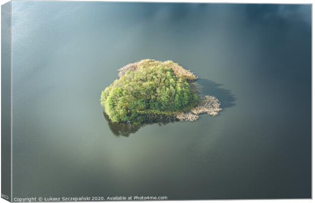 Aerial view of small island on the lake and clouds Canvas Print by Łukasz Szczepański