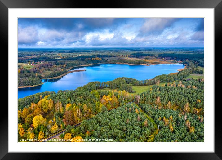 Aerial view of Omulew lake under blue cloudy sky Framed Mounted Print by Łukasz Szczepański