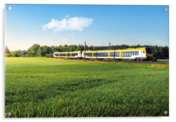 German passenger train in motion. Yellow electric train traveling Acrylic by Daniela Simona Temneanu