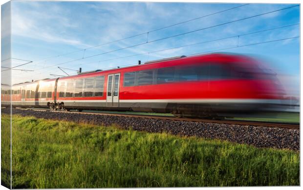High-speed german train traveling through nature. Summer travel Canvas Print by Daniela Simona Temneanu