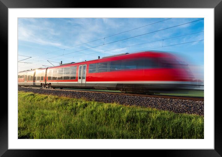 High-speed german train traveling through nature. Summer travel Framed Mounted Print by Daniela Simona Temneanu