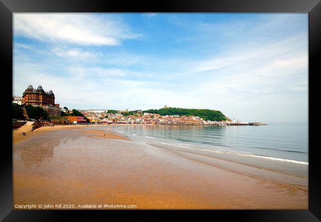 Low tide at Scarborough bay in North Yorkshire.  Framed Print by john hill