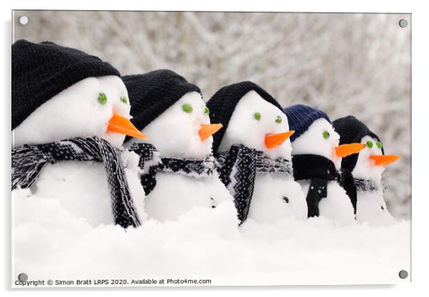 Snowmen close up in a row Acrylic by Simon Bratt LRPS
