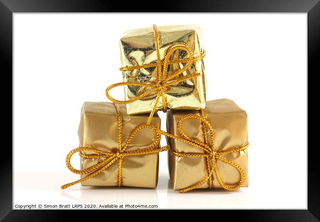 Three gold Christmas parcels Framed Print by Simon Bratt LRPS