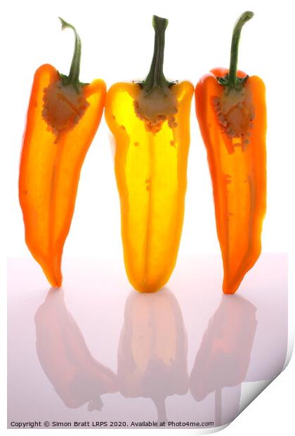 Peppers in half with light through them Print by Simon Bratt LRPS