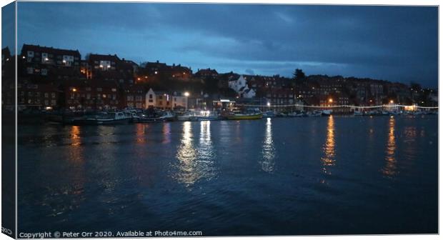 Whitby Harbour at high spring tide Canvas Print by Peter Orr