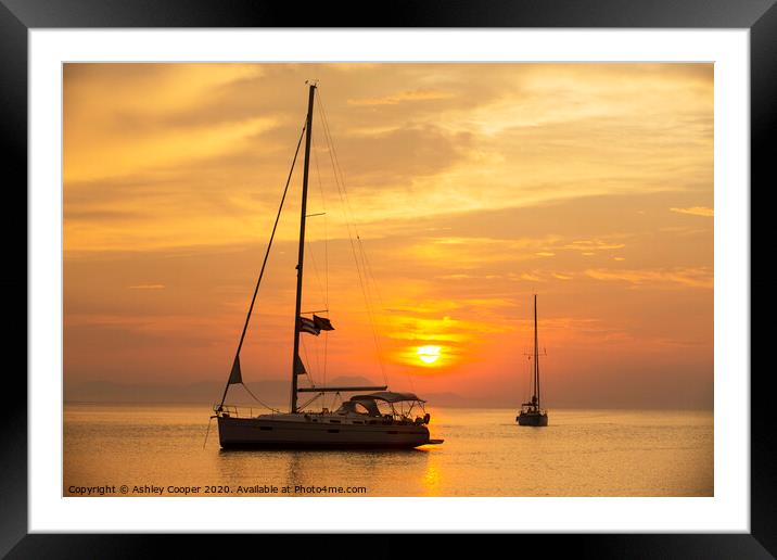 Sunset yacht Framed Mounted Print by Ashley Cooper