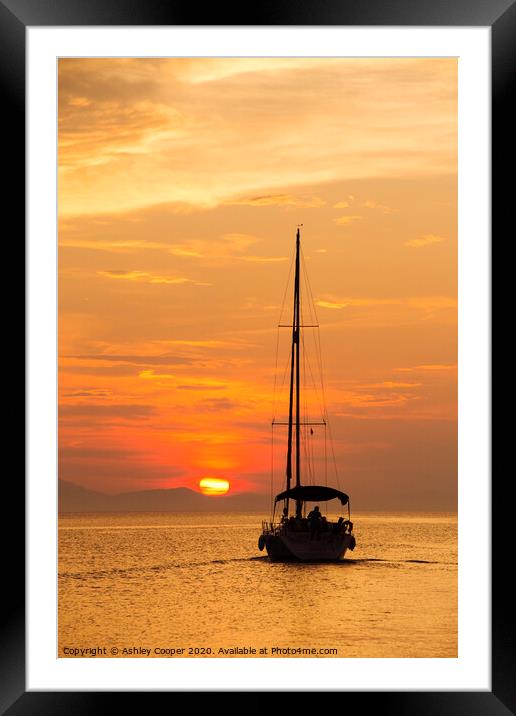 Into the setting sun. Framed Mounted Print by Ashley Cooper