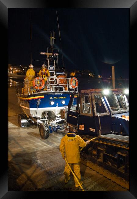'Back from a shout'. St. Ives lifeboat returning at night. Cornwall, UK Framed Print by Peter Bolton