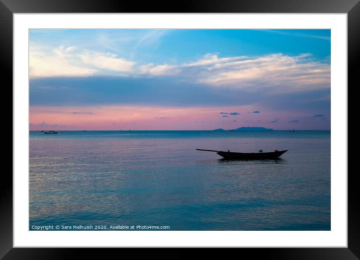 Boat at sunset Framed Mounted Print by Sara Melhuish
