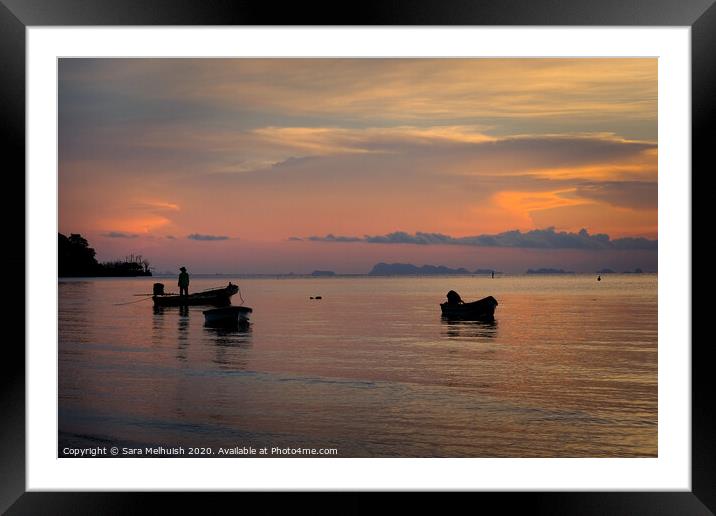 Boats at sunset Framed Mounted Print by Sara Melhuish