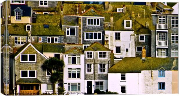 A detail picture of houses rising up from the harbour at St. Ives, Cornwall. Canvas Print by Peter Bolton
