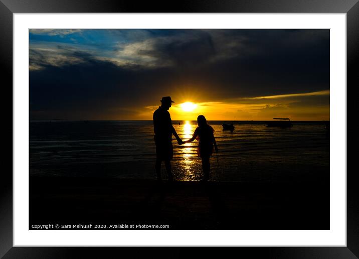 Holding hands at sunset Framed Mounted Print by Sara Melhuish
