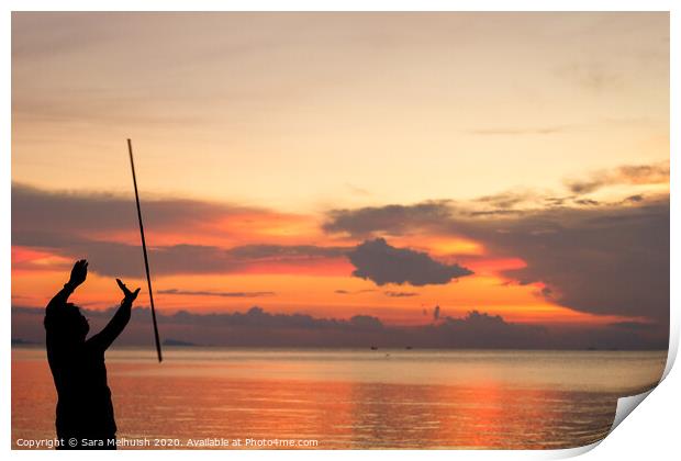 Man juggling at sunset in Thailand Print by Sara Melhuish