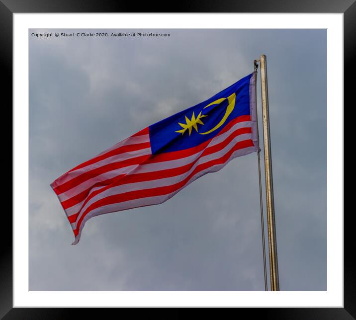 Malaysian flag Framed Mounted Print by Stuart C Clarke