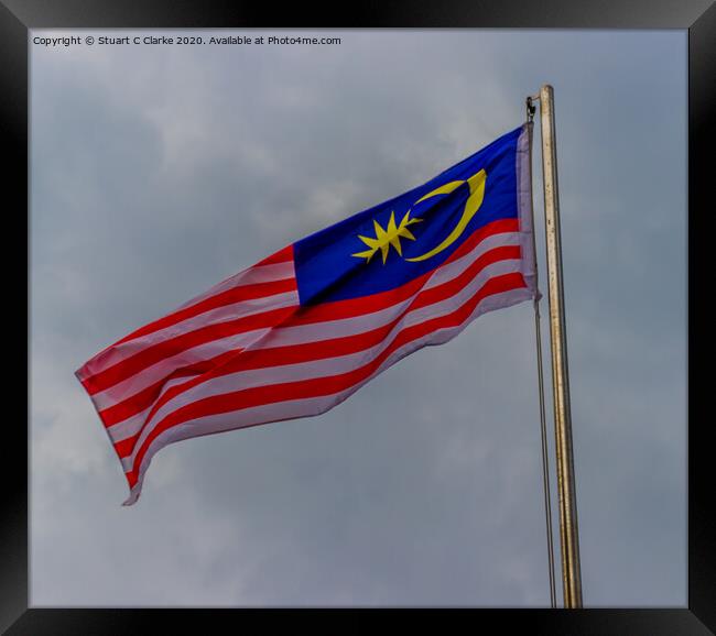 Malaysian flag Framed Print by Stuart C Clarke