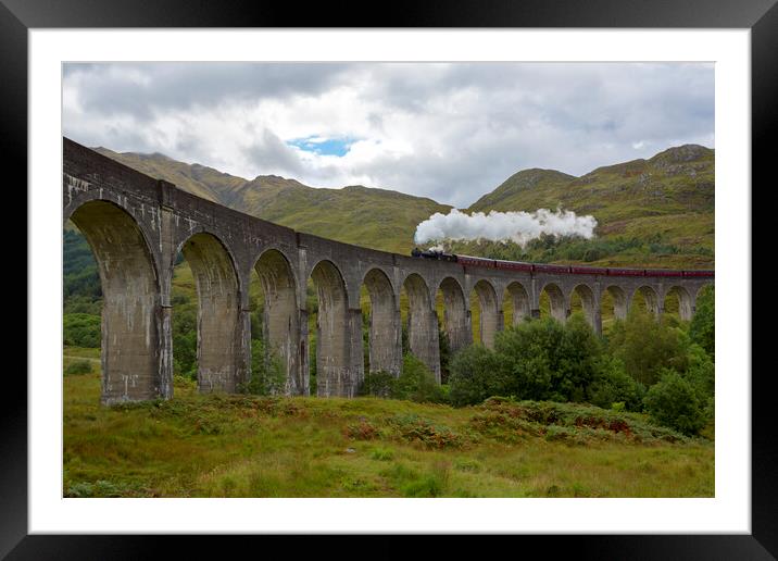 Glenfinnan Viaduct and the Jacobite Steam Train Framed Mounted Print by Derek Beattie