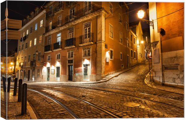 Lisbon Streets at Night in Portugal Canvas Print by Artur Bogacki