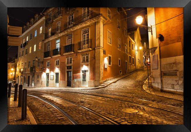Lisbon Streets at Night in Portugal Framed Print by Artur Bogacki