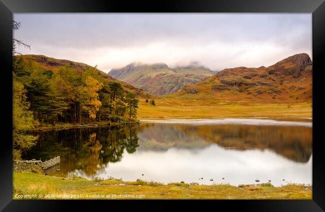 Moody skies over Blea Tarn Framed Print by Jill Bramley