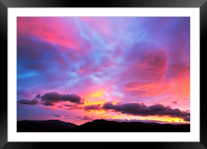 Skies explode Framed Mounted Print by Ashley Cooper