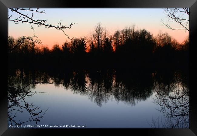 Red sky over Cotswold lake Framed Print by Ollie Hully