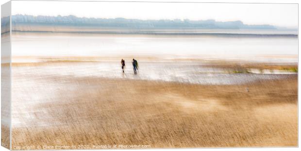Walk along the beach Canvas Print by Clare Edmonds