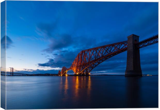 Forth Bridge at dusk. Canvas Print by Tommy Dickson