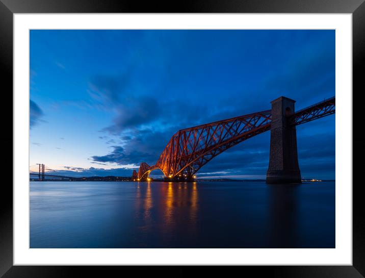 Forth Bridge at dusk. Framed Mounted Print by Tommy Dickson