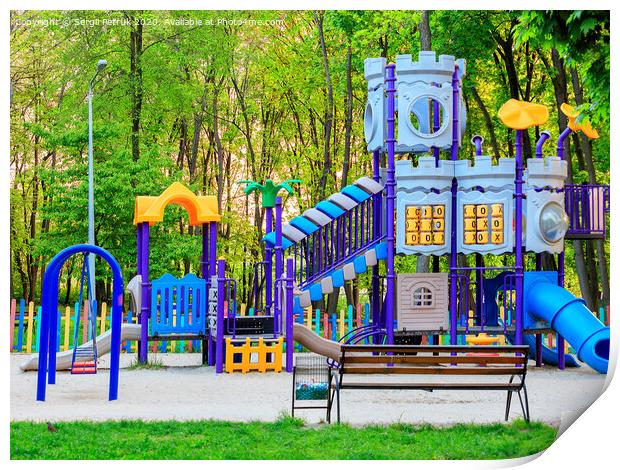 Bright children's colorful playground in the city summer park. Print by Sergii Petruk