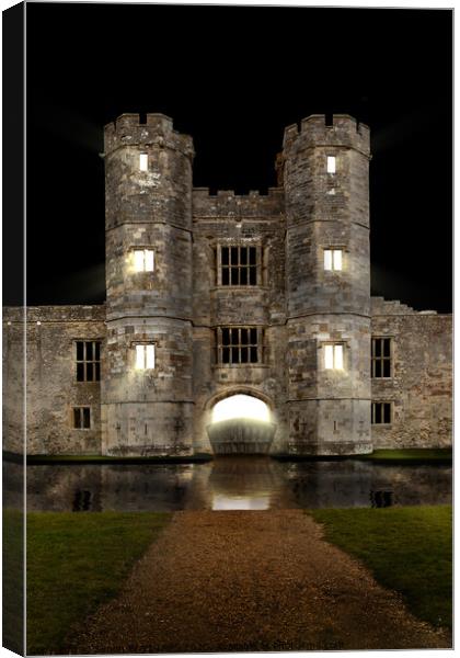 Titchfield Abbey at night with moat and lights shining Canvas Print by Simon Bratt LRPS