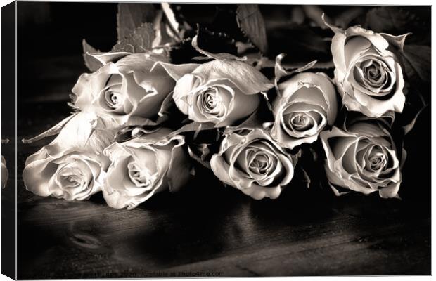 Roses on a table in black and white Canvas Print by Simon Bratt LRPS