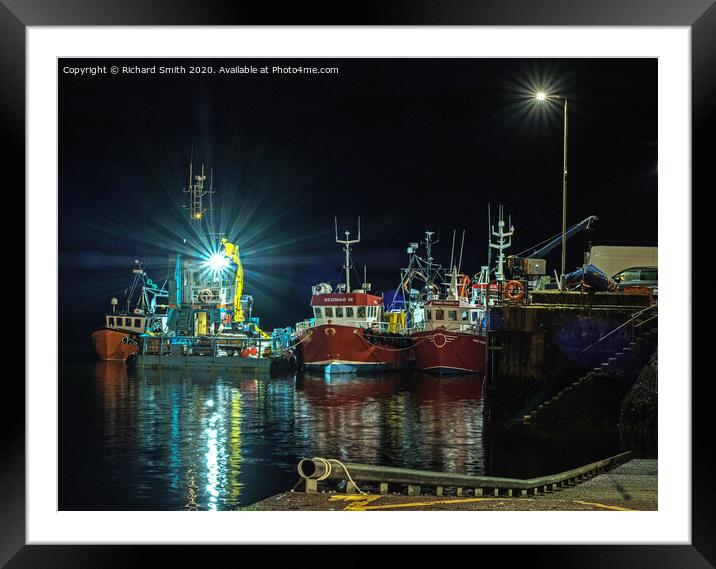 Workboat and Trawlers moored to Portree pier at night. Framed Mounted Print by Richard Smith