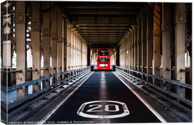 Red Bus Canvas Print by mick gibbons