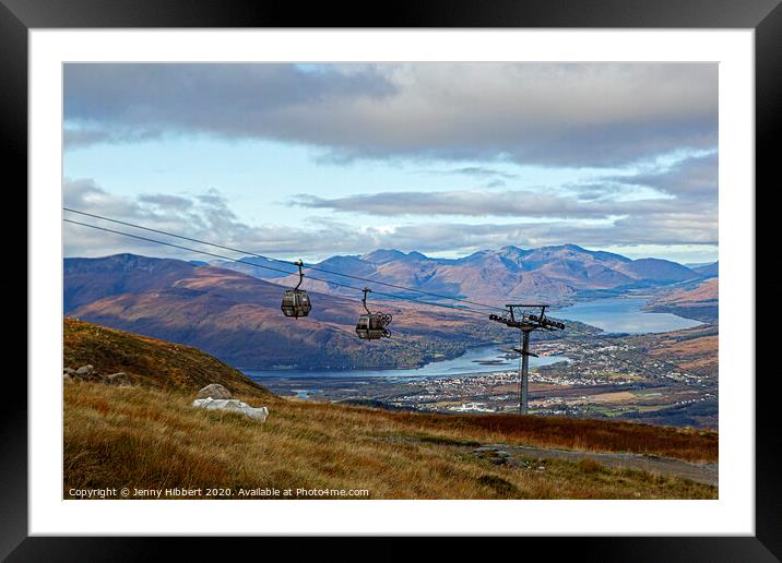 Cable pods with mountain bikes heading up to Aonach Mor Framed Mounted Print by Jenny Hibbert