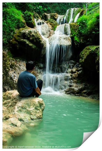 Young man enjoys the waterfall Mudal 2 Print by Hanif Setiawan