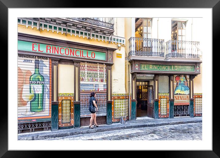 Woman walking past El Rinconcillo bar. Framed Mounted Print by Kevin Hellon