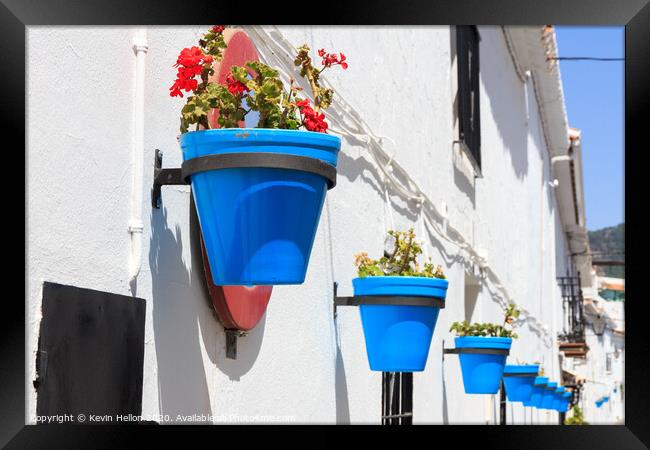 Blue plantpots against whitewashed walls Framed Print by Kevin Hellon