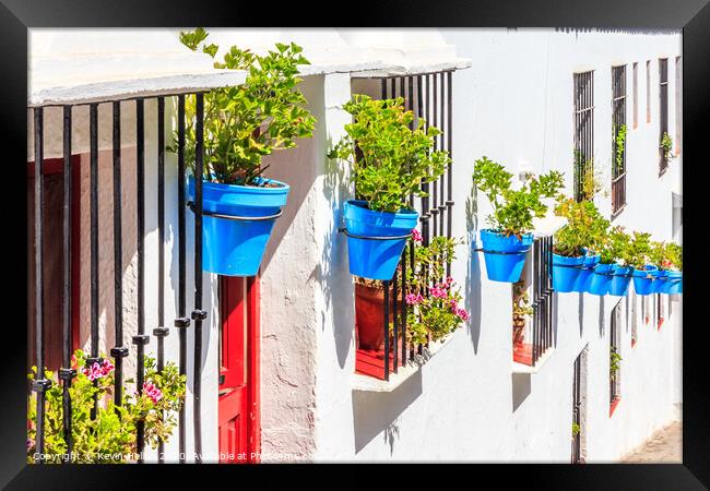 Blue plant pots against whitewashed walls,  Framed Print by Kevin Hellon