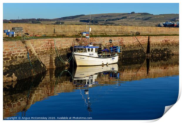 Fishing boat tied up in Cromarty harbour Print by Angus McComiskey