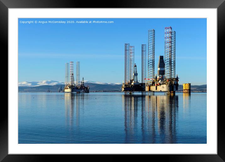 Decommissioned oil rigs in Cromarty Firth Framed Mounted Print by Angus McComiskey