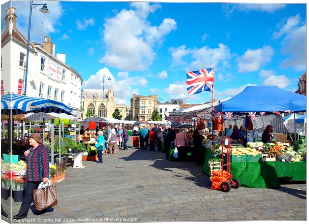 Outdoor market at Boston in Lincolnshire. Canvas Print by john hill