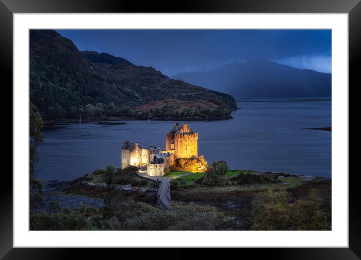 Eilean Donan Castle at night Framed Mounted Print by Roger Daniel
